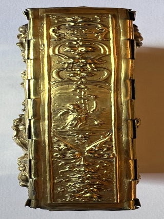 An embossed silver-gilt binding, on a suite of 17th-century engravings of saints.